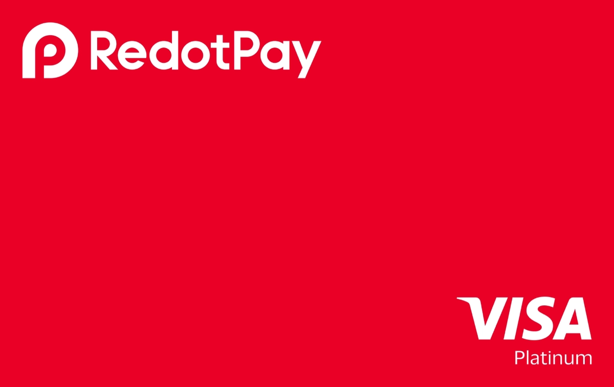 Tarjeta RedotPay roja con logo Visa Platinum